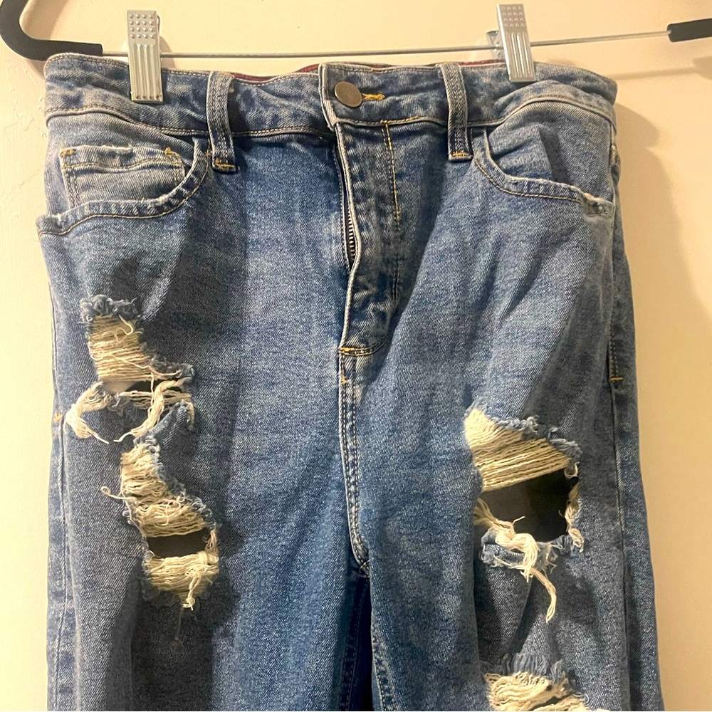Distressed skinny ankle cut jeans